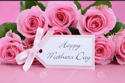 a bouquet of pink roses with a happy mothers day card