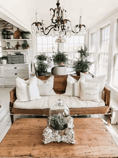 a living room with a couch that has a pillow that says honey bunch