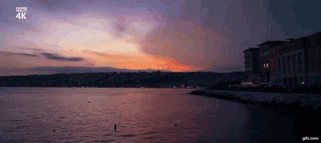 a 4k video of a sunset over a lake