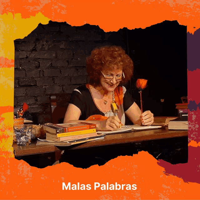 a woman sits at a desk with malas palabras on the bottom