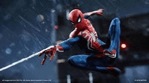 spider-man is flying through the air with a spider web in his hand in a video game .