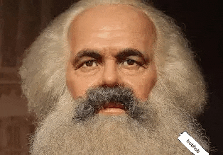 a close up of a man 's face with a beard .