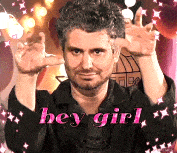 a man with a beard says hey girl in pink