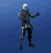 a skeleton is standing with his arms crossed in front of a blue sky .