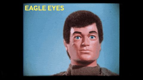 a close up of a man 's face with the words eagle eyes below it