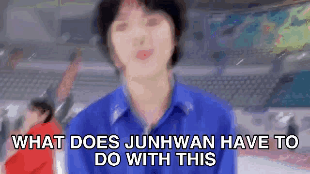 a blurry picture of a person with the words `` what does junhwan have to do with this '' written above them .