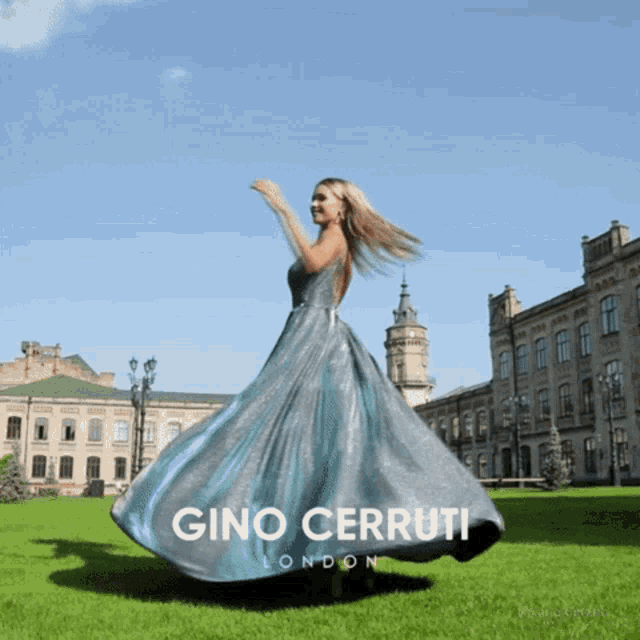 a woman in a gino cerruti london dress is dancing in a field