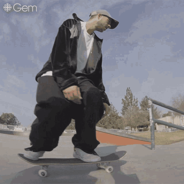 a man riding a skateboard with the word gem on the bottom right