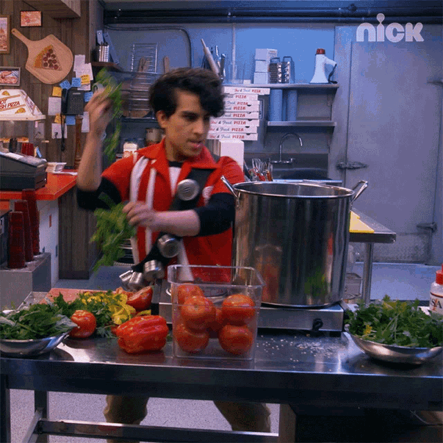 a man in a red and white uniform is preparing food in a kitchen with a sign that says nick on it