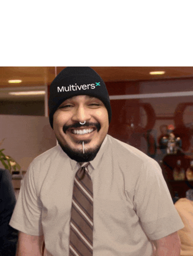 a man wearing a beanie that says multivers