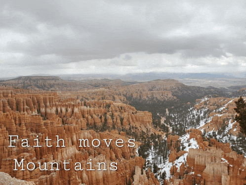 a picture of a canyon with the words faith moves mountains