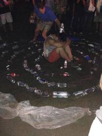 I too witnessed the shrine to the god of sleep at Music Midtown Here is one of his acolytes trying to balance a beer on his head