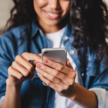 Woman using social media on phone