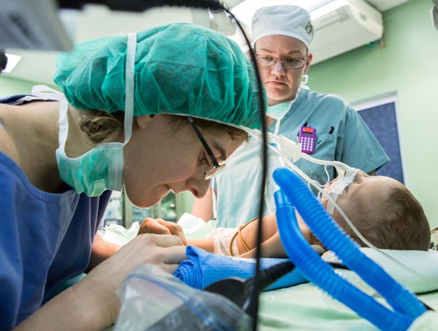 Dr. Anne Csokay administers anesthesia.