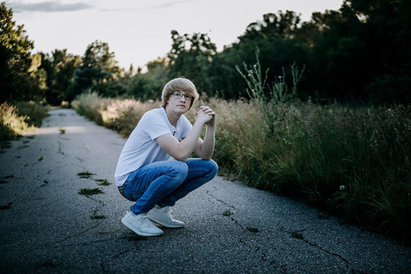 Kneeling down on road is the best Instagram pose