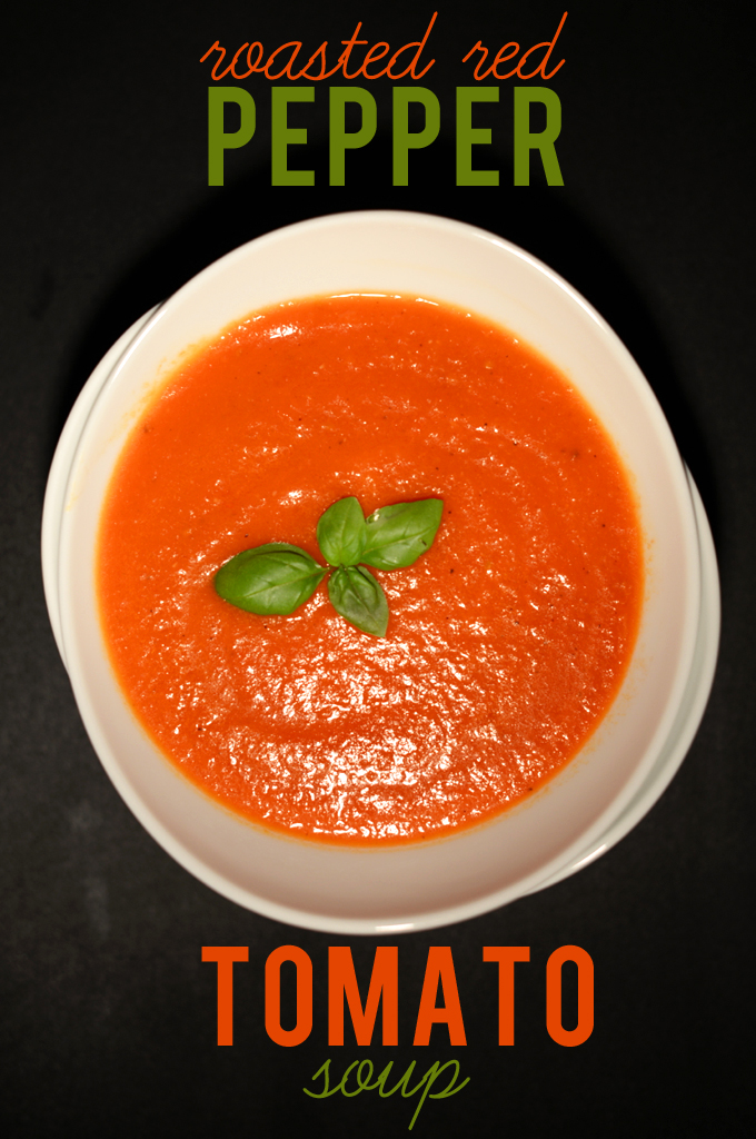 Bowl of simple homemade Roasted Red Pepper Tomato Soup topped with fresh basil