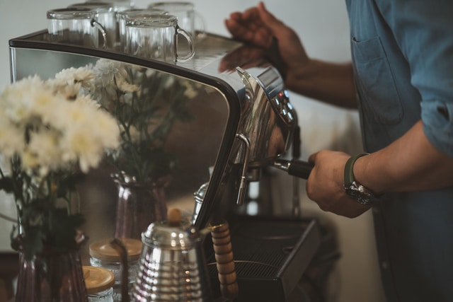 Barista man cafe making coffee preparation service concept in restaurant