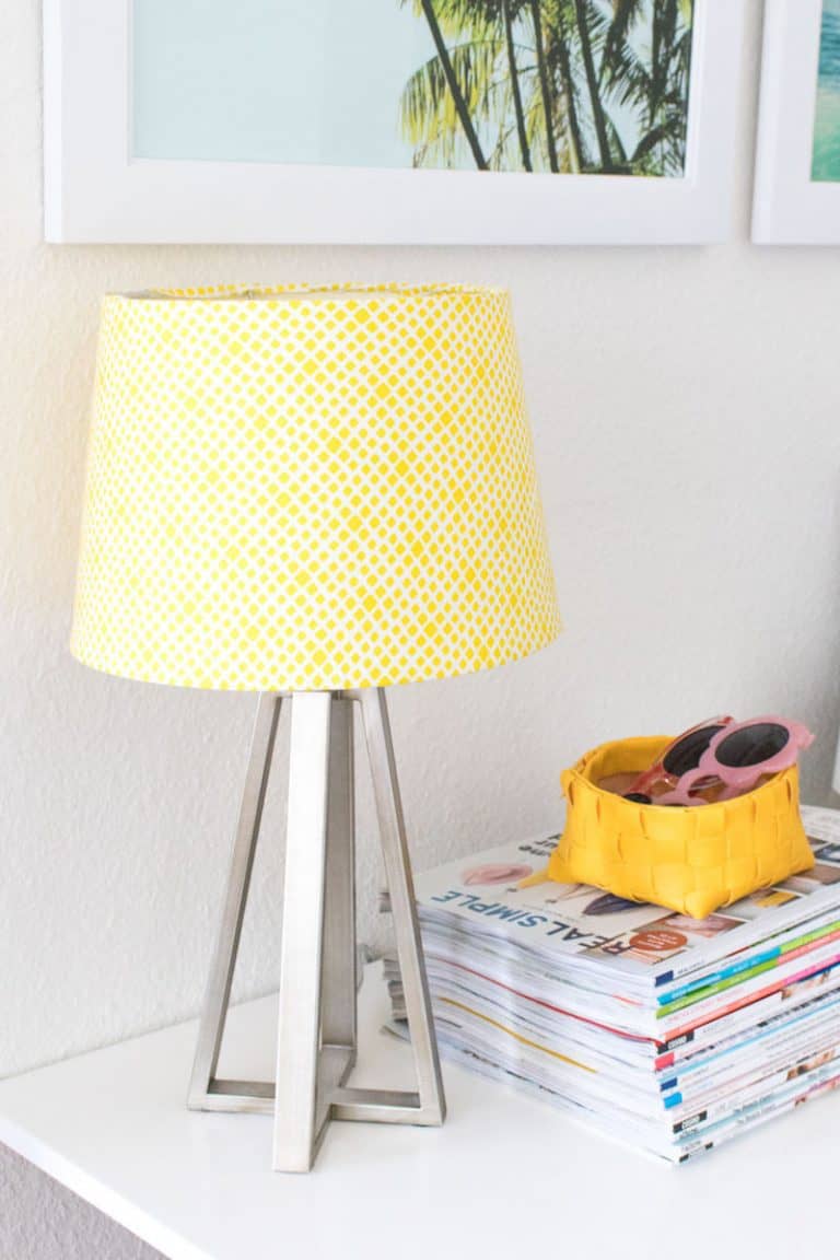 This lampshade makeover project takes less than 30 minutes and it’s incredibly easy to do! Use your favorite fabric along with Mod Podge.