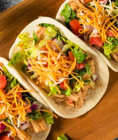 Homemade Shredded Chicken Tacos with Lettuce Cheese Tomatoes