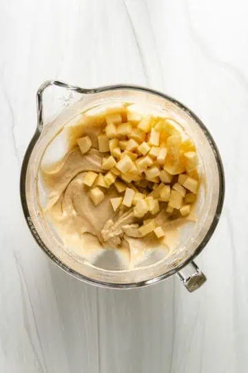 Top down view of muffin batter in a bowl.