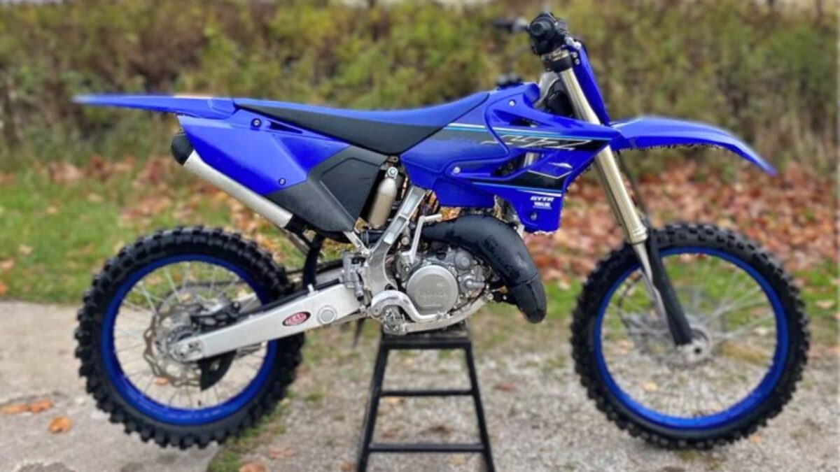 A stock 2021 Yamaha YZ125X 2-stroke enduro bike sitting on a stand