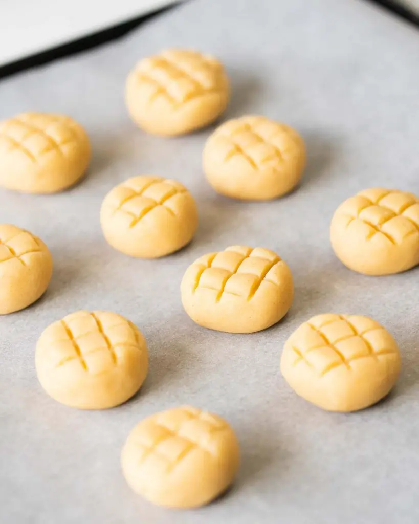 The biscuits, with the pattern pressed into them, ready to be baked. Recipe by movers and bakers