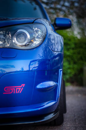 Blue Car Side View Wallpaper