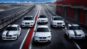 White Bmw M Series Car On Track Wallpaper