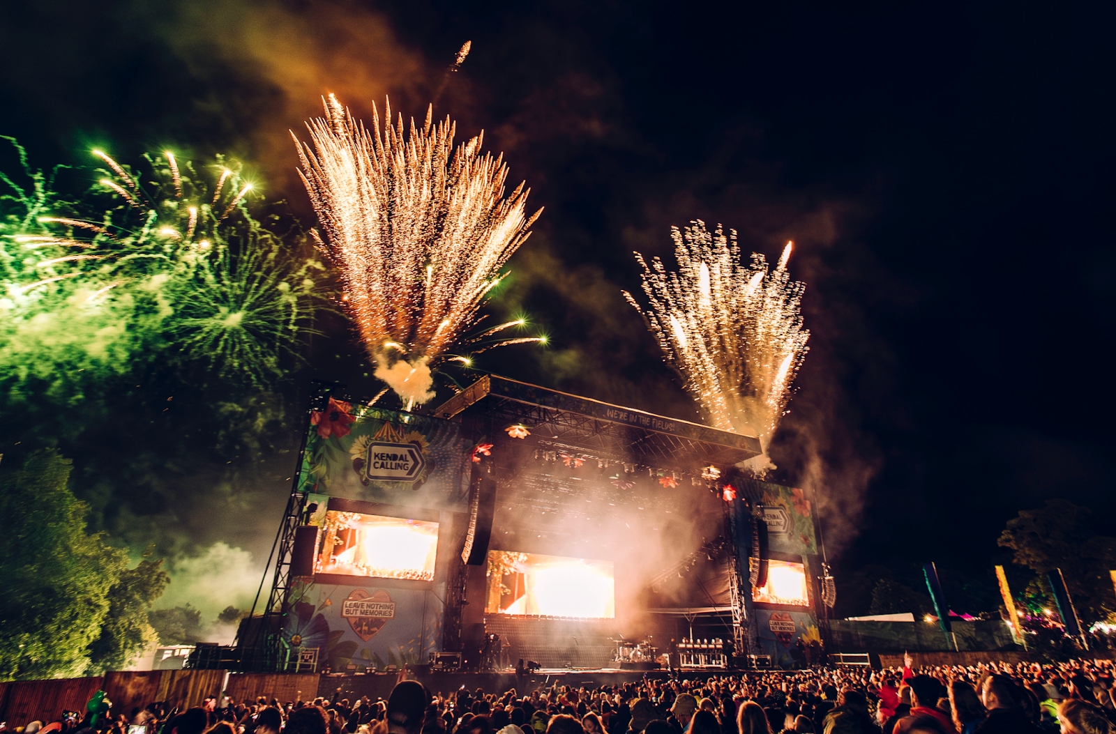 Fireworks going off from the top of the main stage at Kendal Calling