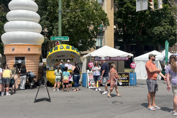 East Jefferson Street filled with art enthusiasts exploring the Syracuse Arts and Crafts Festival