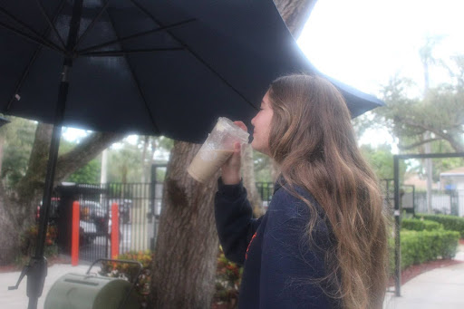 Izzy Levi-Minzi (8) enjoys her coffee by the lunch area