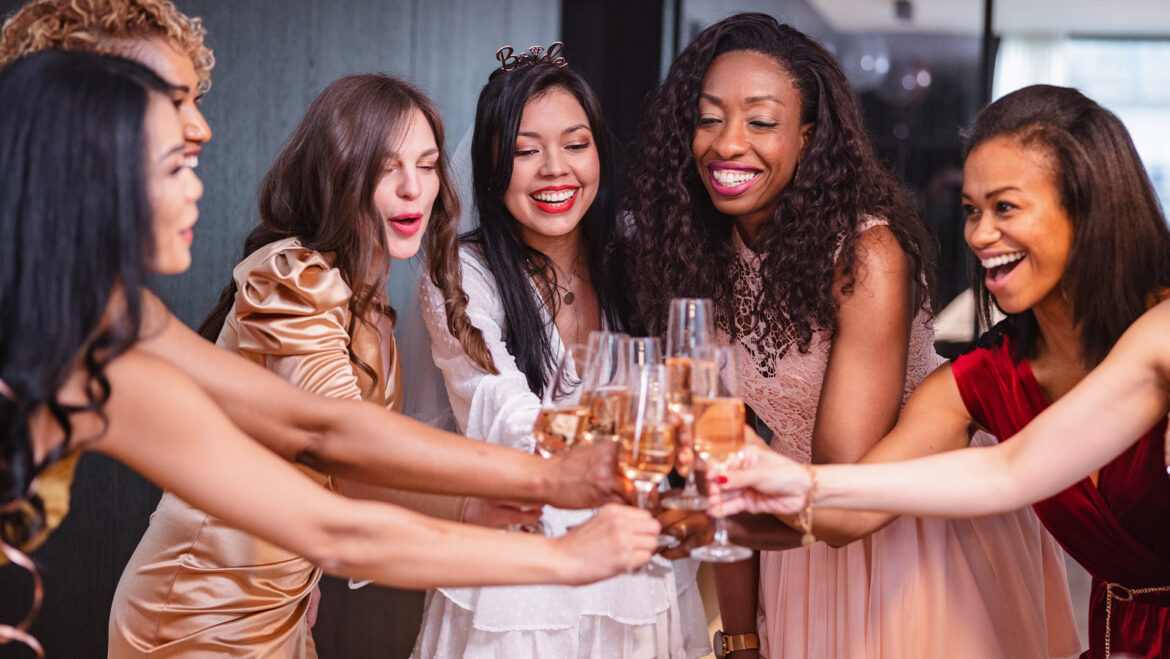 women celebrating bridal shower party with champaign glasses