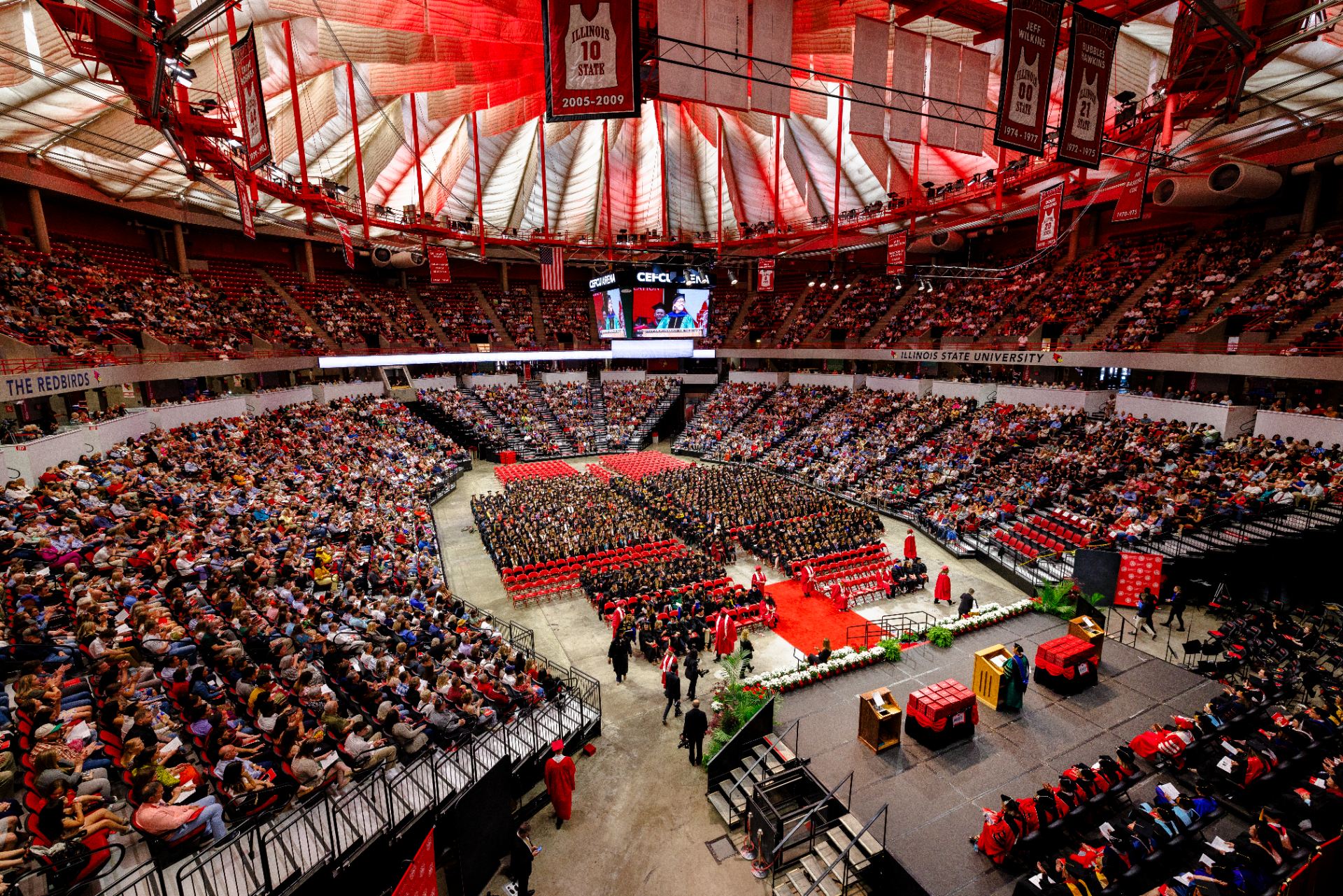 Wide-angle view of CEFCU Arena during commencement.