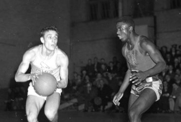 Jackie Robinson guards an Illinois State player