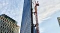 111 Murray Street with crane coming down on south side. Photograph by Michael Young