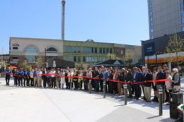 Project partners and city officials gather to celebrate the completion of Anderson Plaza