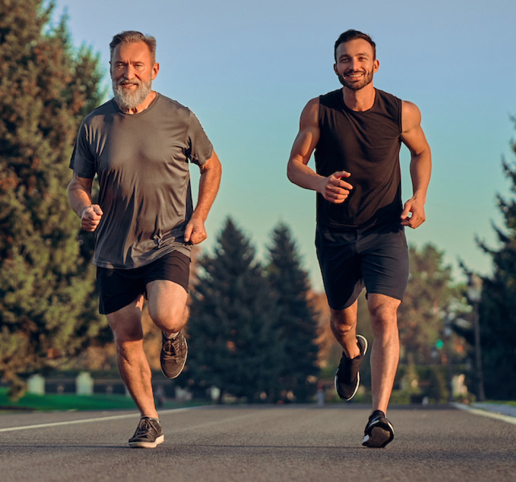 two people running down the street