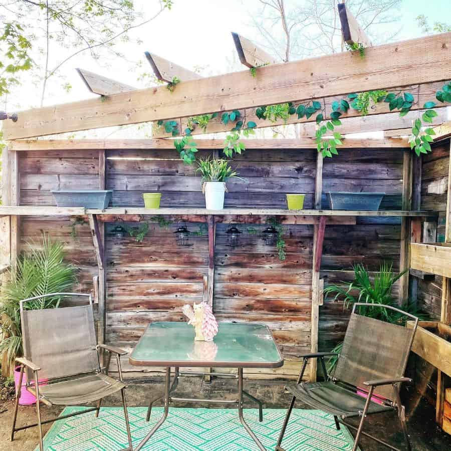 low budget wood patio with table and chairs 