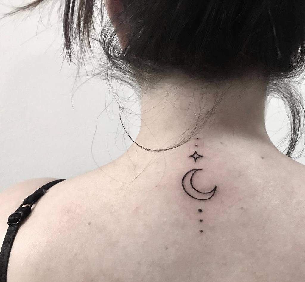 Crescent moon and star with trailing stars and dots down the spine