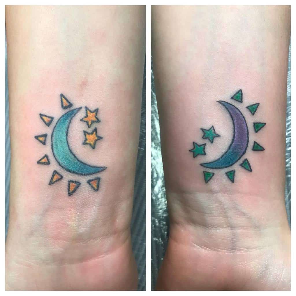 Side-by-side moon tattoos adorned with vibrant orange and shimmering green stars