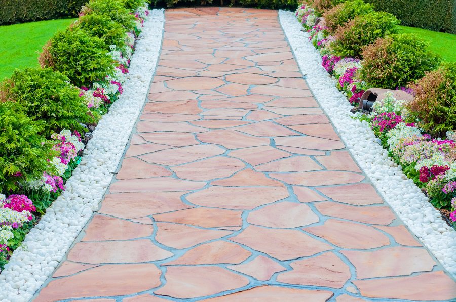 contemporary red stone walkway garden