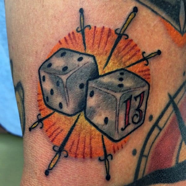 Male Dice And Star Tattoos