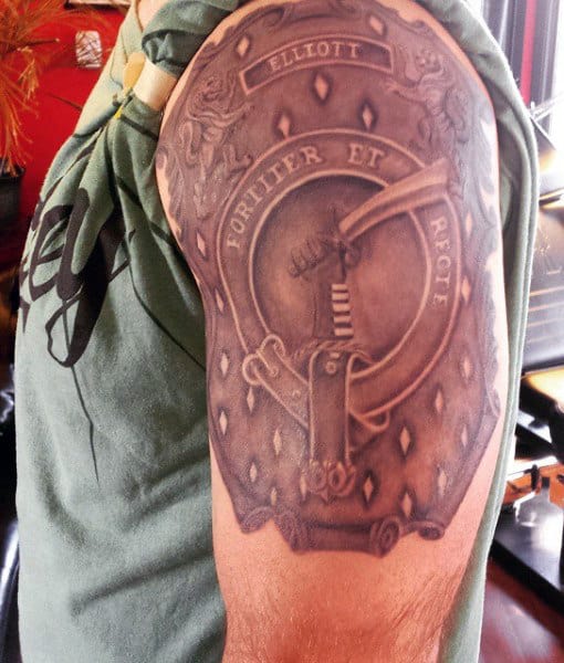 Male Family Crest Tattoo With Hand Waving Sword