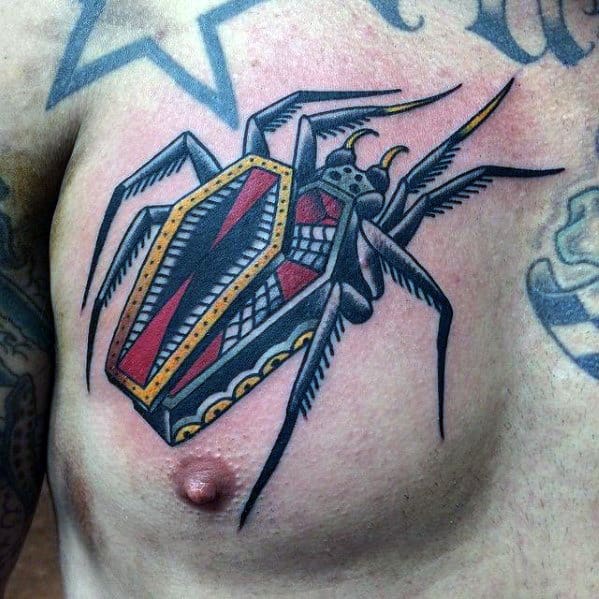 Tattoo of a spider with a red-and-yellow coffin on its back on a chest