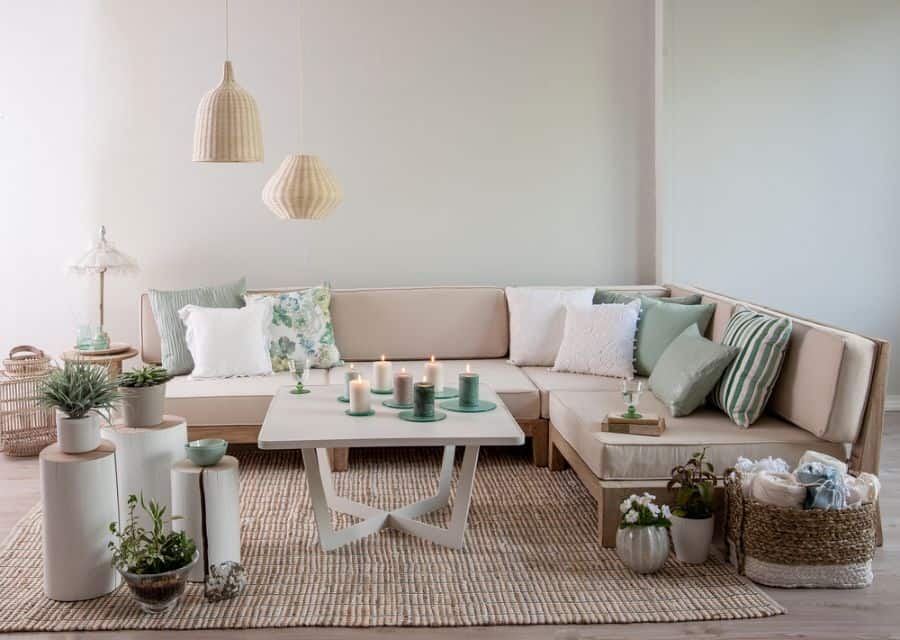 boho style living room with candles on table and cream sofa