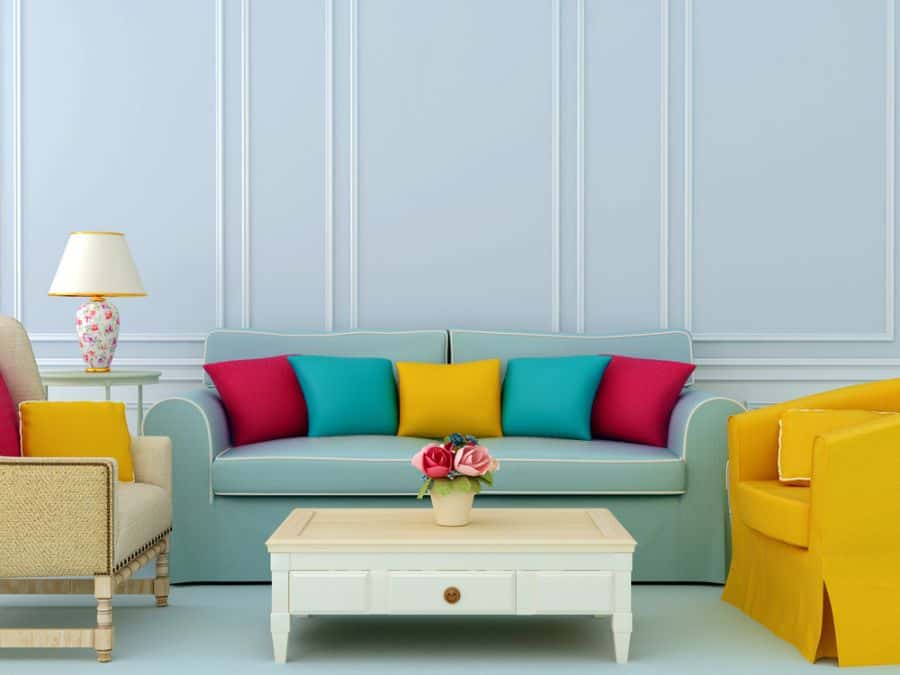 pastel living room with blue and yellow sofas 