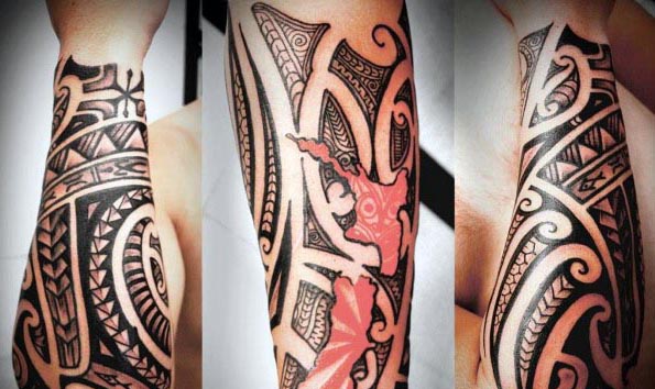 Polynesian-style tattoos on a person's arm