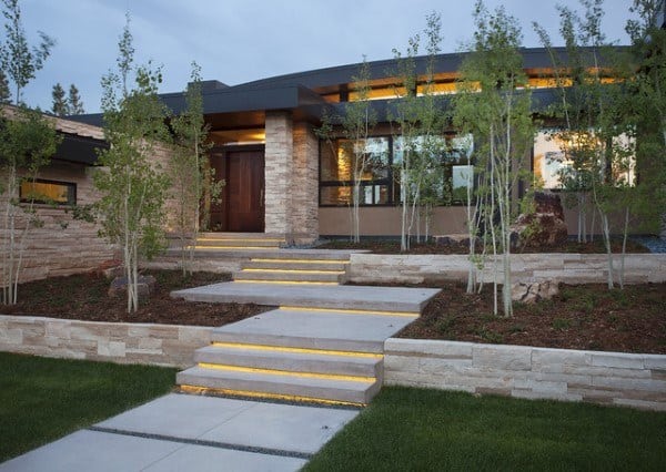 walkway to front door with led lighting under steps