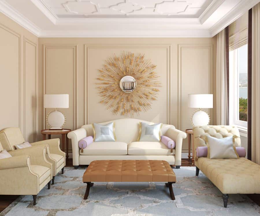 cream colored living room with sofas and ottoman 