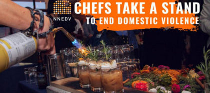 Chef use a blowtorch to toast smores cocktails